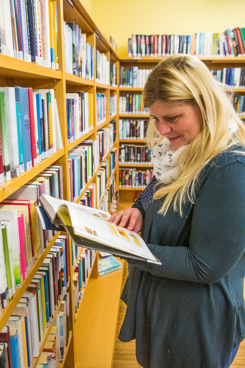 a woman reading a textbook